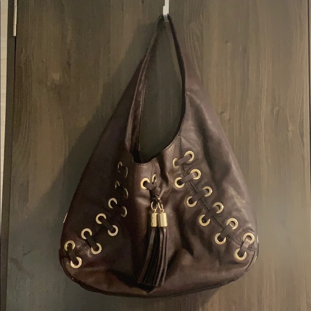 Like New Michael Kors brown leather hobo bag.